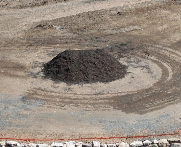 Aerial view of a gravel stockpile on an earthworks site